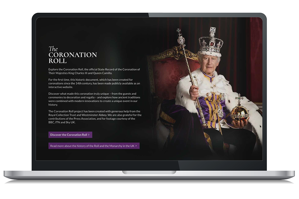 A laptop displays the homepage of the digital Coronation Roll